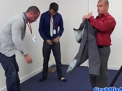 Suited hunk buttfucks his colleague