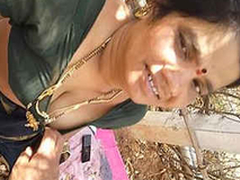 Desi telugu aunty sucking cock with boobs in outdoor
