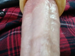 Close-up view of Venus's sex utensil supine sucking the tip of my cock DMVToyLover223