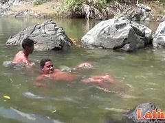 Latin twink fellows get horny splashing in the river